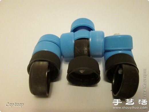 塑料瓶蓋變廢為寶手工制作機械戰警玩具 - www.fasang.cn