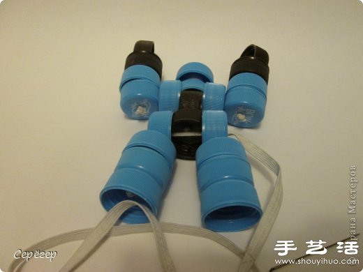 塑料瓶蓋變廢為寶手工制作機械戰警玩具 - www.fasang.cn
